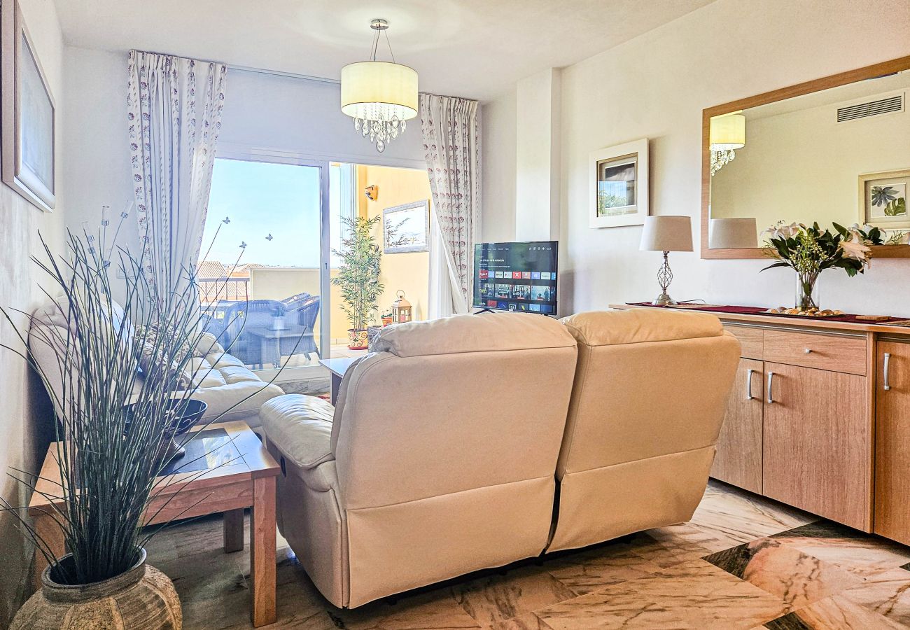 Apartamento en Mijas Costa - Apartamento de dos dormitorios con piscina y vistas al mar.